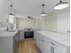 Modern kitchen with gray cabinets and marble countertops at 188 Mary Cir, Concord, NC 28025