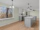 Spacious kitchen with island, stainless steel appliances, and hardwood floors at 188 Mary Cir, Concord, NC 28025