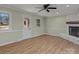 Living room features hardwood floors, fireplace, and lots of natural light at 188 Mary Cir, Concord, NC 28025