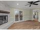 Living room with hardwood floors, fireplace, and access to deck at 188 Mary Cir, Concord, NC 28025