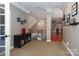 Upstairs hallway with hardwood floors and a chandelier at 2002 Streamview Ct, Waxhaw, NC 28173