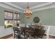 Spacious dining room with large windows, chandelier and hardwood floors at 2008 Thurston Dr, Indian Trail, NC 28079