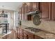 Kitchen features gas cooktop and granite countertops at 2008 Thurston Dr, Indian Trail, NC 28079