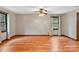 Spacious living room with hardwood floors and ceiling fan at 205 E Jimmy St, Candor, NC 27229