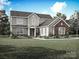 Two-story house with stone accents and a landscaped lawn at 2075 Fordhill St, Rock Hill, SC 29732