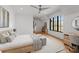 Inviting bedroom with hardwood floors, a large window, a cozy bed, and modern furnishings at 2103 Cortelyou Rd, Charlotte, NC 28211