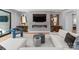 Cozy living room featuring a modern fireplace, plush seating, and elegant decor at 2103 Cortelyou Rd, Charlotte, NC 28211