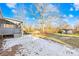 Large backyard with a shed and partial snow cover on the ground at 257 Jefferson St, Statesville, NC 28677