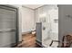 Bathroom with walk-in shower and wood flooring at 302 S College St, Monroe, NC 28112