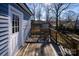 Wooden deck overlooking backyard with access from kitchen at 302 S College St, Monroe, NC 28112