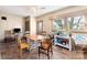 Cozy dining area with wood table and chairs, near kitchen at 302 S College St, Monroe, NC 28112