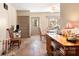 Casual dining area with wood table and built-in shelving at 302 S College St, Monroe, NC 28112