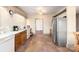 Kitchen features stainless steel appliances and tile floors at 302 S College St, Monroe, NC 28112