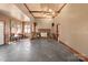 Spacious living room with high ceiling and stone floors at 302 S College St, Monroe, NC 28112