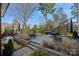 Spacious backyard with patio, seating area, and landscaping at 3027 Westfield Rd, Charlotte, NC 28209