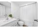 Clean bathroom with shower/tub combo and white vanity at 352 Twinflower Ln, Charlotte, NC 28205