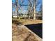 Large backyard with mature trees and grass at 376 Friedheim Rd, Rock Hill, SC 29730