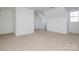 Large bedroom with neutral walls and carpet flooring at 4030 Garden Oak Dr, Indian Trail, NC 28079