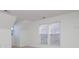 Bright bedroom featuring carpet and multiple windows at 4030 Garden Oak Dr, Indian Trail, NC 28079