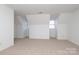 Spacious bedroom with neutral carpet and sloped ceilings at 4030 Garden Oak Dr, Indian Trail, NC 28079