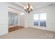 Spacious dining room featuring a chandelier and hardwood floors at 4030 Garden Oak Dr, Indian Trail, NC 28079