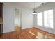 Dining room with hardwood floors and view of kitchen at 4030 Garden Oak Dr, Indian Trail, NC 28079