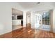 Sunroom with hardwood floors, access to kitchen and deck at 4030 Garden Oak Dr, Indian Trail, NC 28079