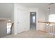 Upstairs hall with carpet flooring and linen closet at 4030 Garden Oak Dr, Indian Trail, NC 28079