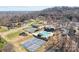 Bird's eye view of community amenities including a pool, tennis courts, and playground, perfect for active families at 411 Major Run, Cramerton, NC 28032