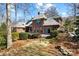 This beautiful back exterior offers an expansive backyard with a patio perfect for entertaining guests at 411 Major Run, Cramerton, NC 28032