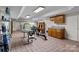 Finished basement area with tile flooring and a versatile layout at 411 Major Run, Cramerton, NC 28032