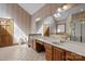 A long vanity with double sinks sits across from a door and a toilet at 411 Major Run, Cramerton, NC 28032
