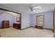 Neutral-toned bedroom with hardwood floors, natural light, and cozy decor for relaxation at 411 Major Run, Cramerton, NC 28032