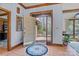 Inviting foyer featuring tile flooring and a decorative glass door, setting a welcoming tone for the home at 411 Major Run, Cramerton, NC 28032