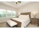 Bright and airy main bedroom with plush bedding at 457 Lahinch Dr, Tega Cay, SC 29708