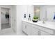 Double vanity bathroom with walk-in shower and closet at 5149 Fireweed Ct, Dallas, NC 28034