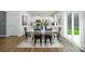 Kitchen and dining area with hardwood floors, white table and black chairs, and access to backyard at 5149 Fireweed Ct, Dallas, NC 28034