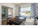 Spacious home office with a desk, built-in shelving and access to another room at 5149 Fireweed Ct, Dallas, NC 28034