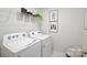 Bright laundry room with Whirlpool washer and dryer at 5149 Fireweed Ct, Dallas, NC 28034