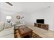 Living room with sofas, coffee table, and TV stand at 6129 Artigas Dr, Indian Land, SC 29707