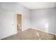 Spacious bedroom with private access to the bathroom at 6303 Windsor Gate Ln, Charlotte, NC 28215