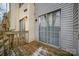 Small wooden deck with access to the house at 6303 Windsor Gate Ln, Charlotte, NC 28215