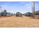 Newly constructed homes showcasing distinct architectural styles and ample yard space at 8078 Blackwood Rd, Denver, NC 28037