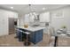 Stunning kitchen featuring a large island, modern stainless steel appliances, and lots of cabinet storage at 8078 Blackwood Rd, Denver, NC 28037