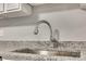 Modern kitchen sink and faucet with granite countertop at 109 Belton Ave, Mount Holly, NC 28120