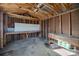Unfinished shed interior with workbench and storage at 109 Belton Ave, Mount Holly, NC 28120