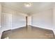 Neutral bedroom offering hardwood floors and natural light at 122 Quinn Ave, Gastonia, NC 28054