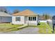 Cozy home with manicured lawn and gravel driveway at 122 Quinn Ave, Gastonia, NC 28054