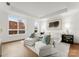 Bright bedroom with hardwood floors and large windows at 130 Cherokee Rd # 304, Charlotte, NC 28207