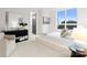 Spacious bedroom with plush carpeting and large window at 130 Cherokee Rd # 304, Charlotte, NC 28207